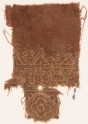 Textile fragment with medallion and reversed script