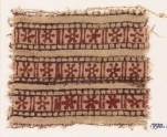 Textile fragment with bands of rosettes and lines