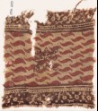 Textile fragment with S-shapes and an ornate quatrefoil