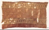 Textile fragment with chevrons and rosettes