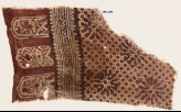Textile fragment with rosettes, dots, and tab-shapes
