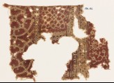 Textile fragment with interlocking circles, interlaced tendrils, and flower-heads