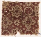 Textile fragment with rosettes, circles, and quatrefoils