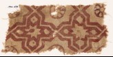 Textile fragment with four-pointed stars