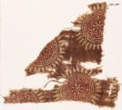 Textile fragment with rosettes and stars in dotted circles