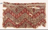 Textile fragment with chevrons, hexagons, and flowers