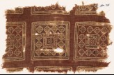 Textile fragment possibly imitating patola pattern, with squares, rosettes, and diamond-shapes