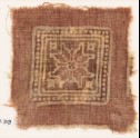 Textile fragment with dotted square and rosette
