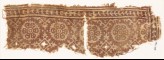Textile fragment with rosettes and four-pointed stars (EA1990.738)