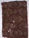 Textile fragment with linked medallions