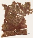Textile fragment with floral medallion and Persian-style script