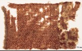 Textile fragment with pointed ovals, squares, and tendrils