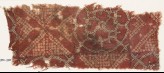 Textile fragment with bandhani, or tie-dye, imitation and interlocking circles