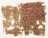 Textile fragment with quatrefoil, stylized stem, and leaf (EA1990.797)