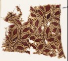 Textile fragment with branches and leaves (EA1990.821)