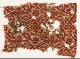 Textile fragment with interlacing tendrils, leaves, and flowers (EA1990.827)