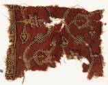 Textile fragment with dotted tendrils, leaves, and rosettes (EA1990.832)