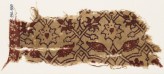 Textile fragment with interlacing tendrils, flowers, and leaves (EA1990.838)