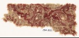 Textile fragment with swirling tendrils and flower-heads (EA1990.852)