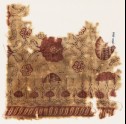 Textile fragment with flowers and interlace