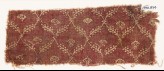 Textile fragment with linked branches and carnations (EA1990.874)