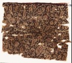Textile fragment with tendrils and flowers, possibly from a garment (EA1990.882)