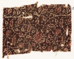 Textile fragment with tendrils and flowers, possibly from a garment (EA1990.883)