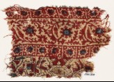 Textile fragment with vine and stars