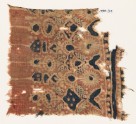 Textile fragment with stylized plants (EA1990.912)