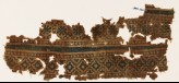 Textile fragment with rosettes and stepped diamond-shapes (EA1990.920)