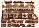 Textile fragment with bands of squares, diamond-shapes, and rosettes (EA1990.926)