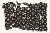 Textile fragment with rosettes, stars, and squares