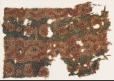 Textile fragment with tendrils and vine leaves (EA1990.960)