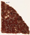 Textile fragment with stylized plants and stems