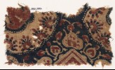 Textile fragment with heart-shaped leaves and parts of medallions (EA1990.1007)