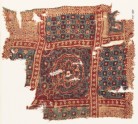 Textile fragment with large medallion, squares, and rosettes
