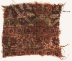 Textile fragment with stars, interlace, and possibly linked medallions (EA1990.1017)
