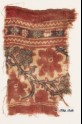 Textile fragment with tendrils, vine leaves, and flowers or fruit