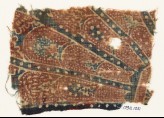 Textile fragment with part of a large rosette medallion (EA1990.1031)