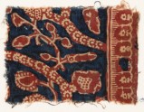 Textile fragment with tendrils, leaves, and rosettes