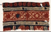 Textile fragment with crossed tendrils and rosettes (EA1990.1090)