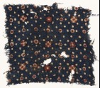 Textile fragment with dots and rosettes (EA1990.1093)