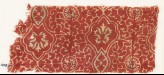 Textile fragment with tendrils, ovals, and flowers (EA1990.1110)
