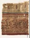 Textile fragment with stylized plants, a cartouche, and interlace (EA1990.1116)