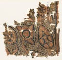 Textile fragment with stylized leaves, tendrils, and bunches of fruit