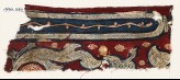 Textile fragment with cross-hatched frame and leaves (EA1990.1142)