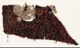 Textile fragment with tendrils and flower (EA1990.1152)