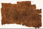 Textile fragment with star, chevrons, and flowers (EA1990.1189)
