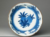 Foliated bowl with flowers and birds