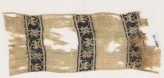 Textile from a scarf or girdle with scrolling tendrils and flowers